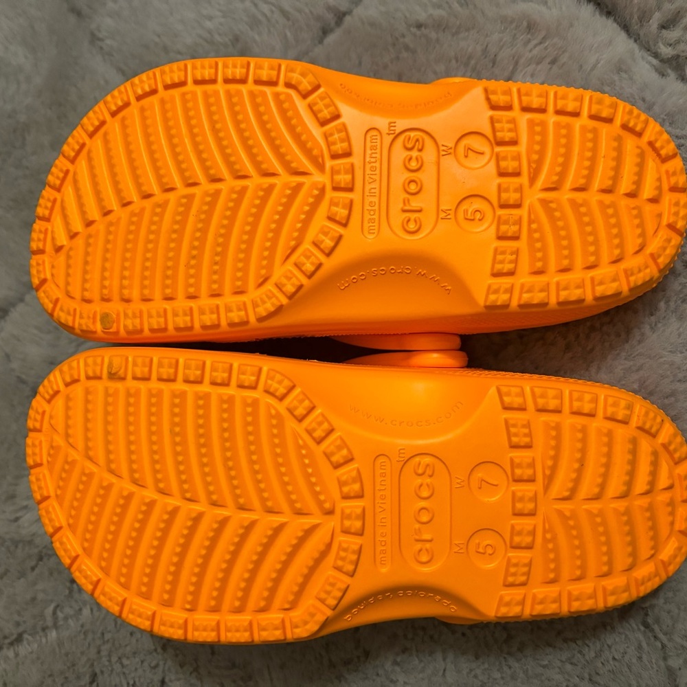 Orange crocs